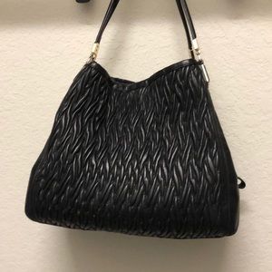 Black leather authentic Coach purse.